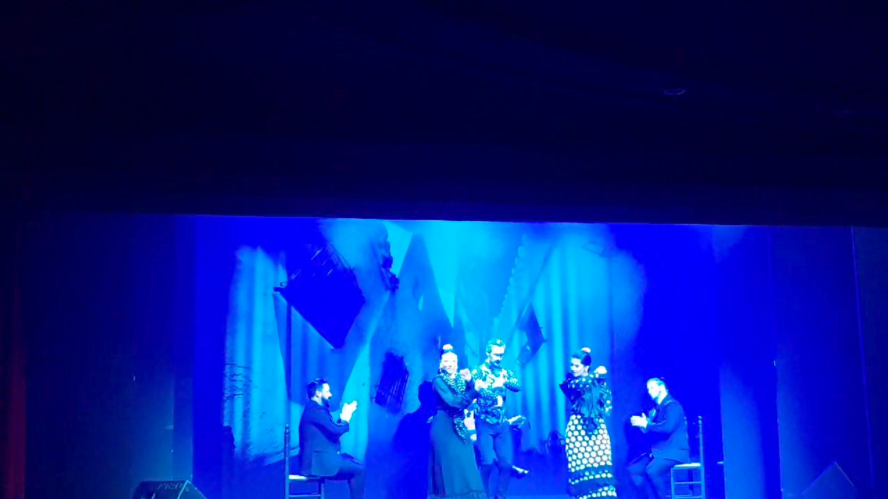 Blue-lit flamenco performers, from Edna’s Madrid video